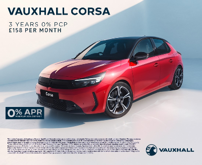 Red Vauxhall Corsa with finance offer details displayed.